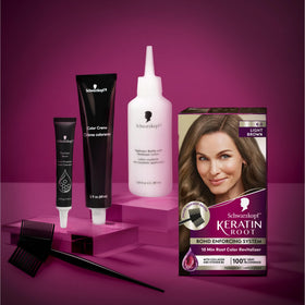 Schwarzkopf color cream and developer displayed for contents clarity