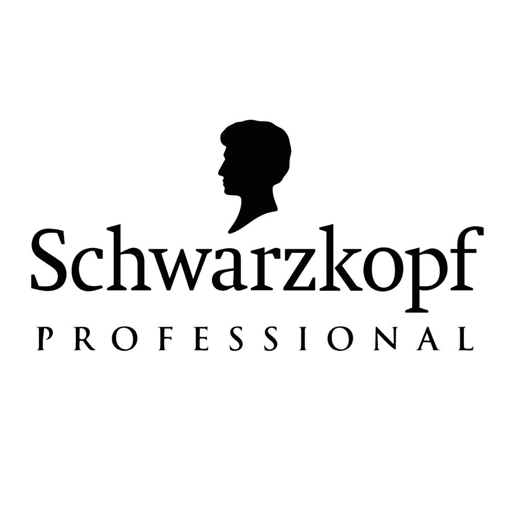 Schwarzkopf Igora Royal applied to hair by stylist showing even coverage and gold tones