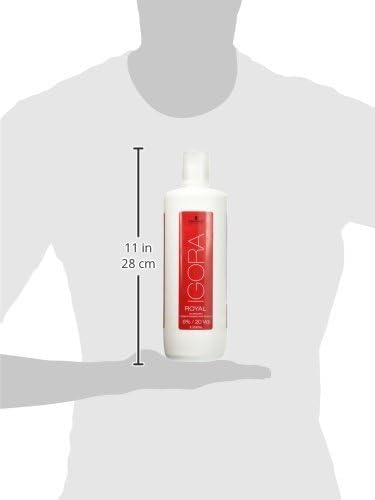 Schwarzkopf developer next to ruler and brush, showing large 33.8 fl oz capacity