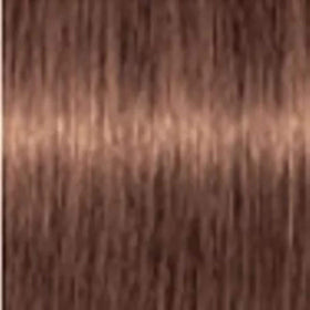 Schwarzkopf Igora ROYAL swatch and application demonstrating warm gold-copper result