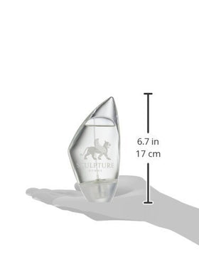 Sculpture by Nikos bottle held in hand to show 3.4 oz scale and portable everyday size