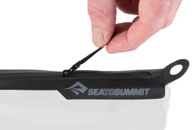 Sea to Summit pouch on bathroom counter showing travel-ready kit for streamlined routines