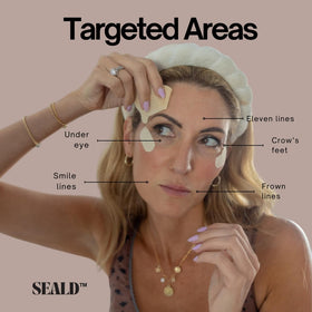 SEALD size comparison next to a finger to show thin scale and subtle visibility reduction