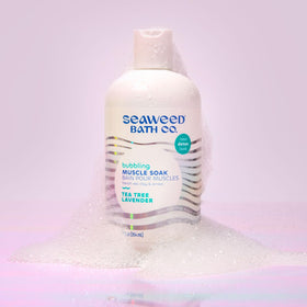 Bottle label with recycled plastic mark, communicates eco-friendly packaging