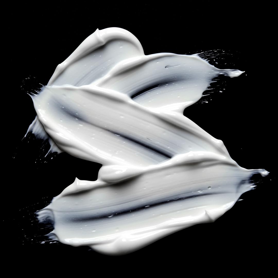 Sebastian product being combed through hair to show reduced tangles