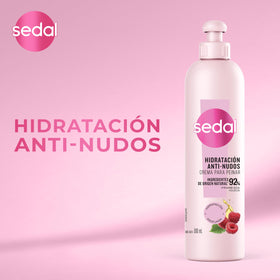 Sedal being applied to damp hair to detangle and make combing easier