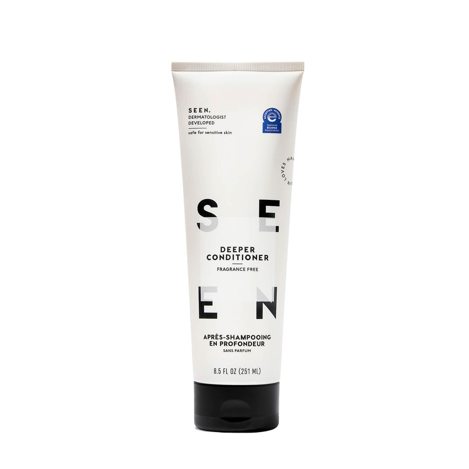SEEN bottle front label showing product name and eczema-safe benefit