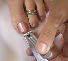 Seki EDGE held in hand demonstrating ergonomic control and reduced slipping