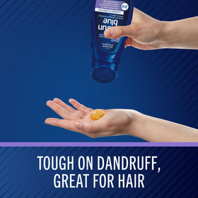 Selsun Blue shampoo pouring with lather showing texture and coverage