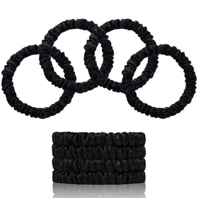 SEMRUE front packaging showing four black silk scrunchies, elegant gift-ready presentation