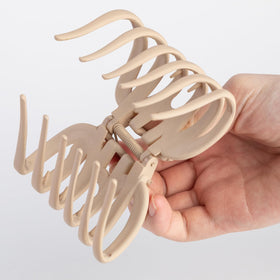 Seneeel size comparison with hand showing 3.8-inch scale for large sections
