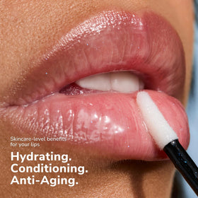 SeneGence gloss over lips lifestyle image showing protective shine and enhanced color longevity