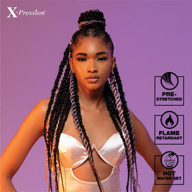 Sensationnel model outdoors wearing long braids for everyday protection