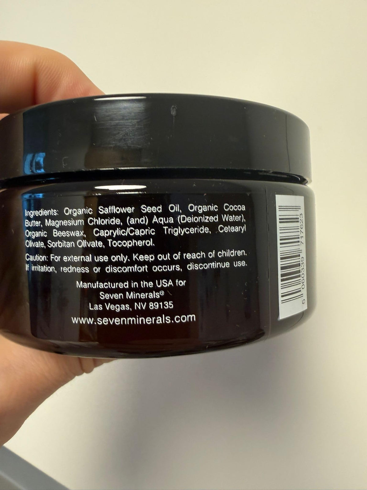 Seven Minerals applying cream to forearm demonstrating easy absorption benefit