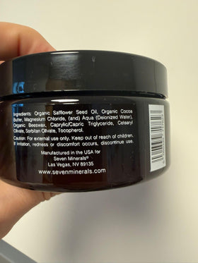 Seven Minerals applying cream to forearm demonstrating easy absorption benefit