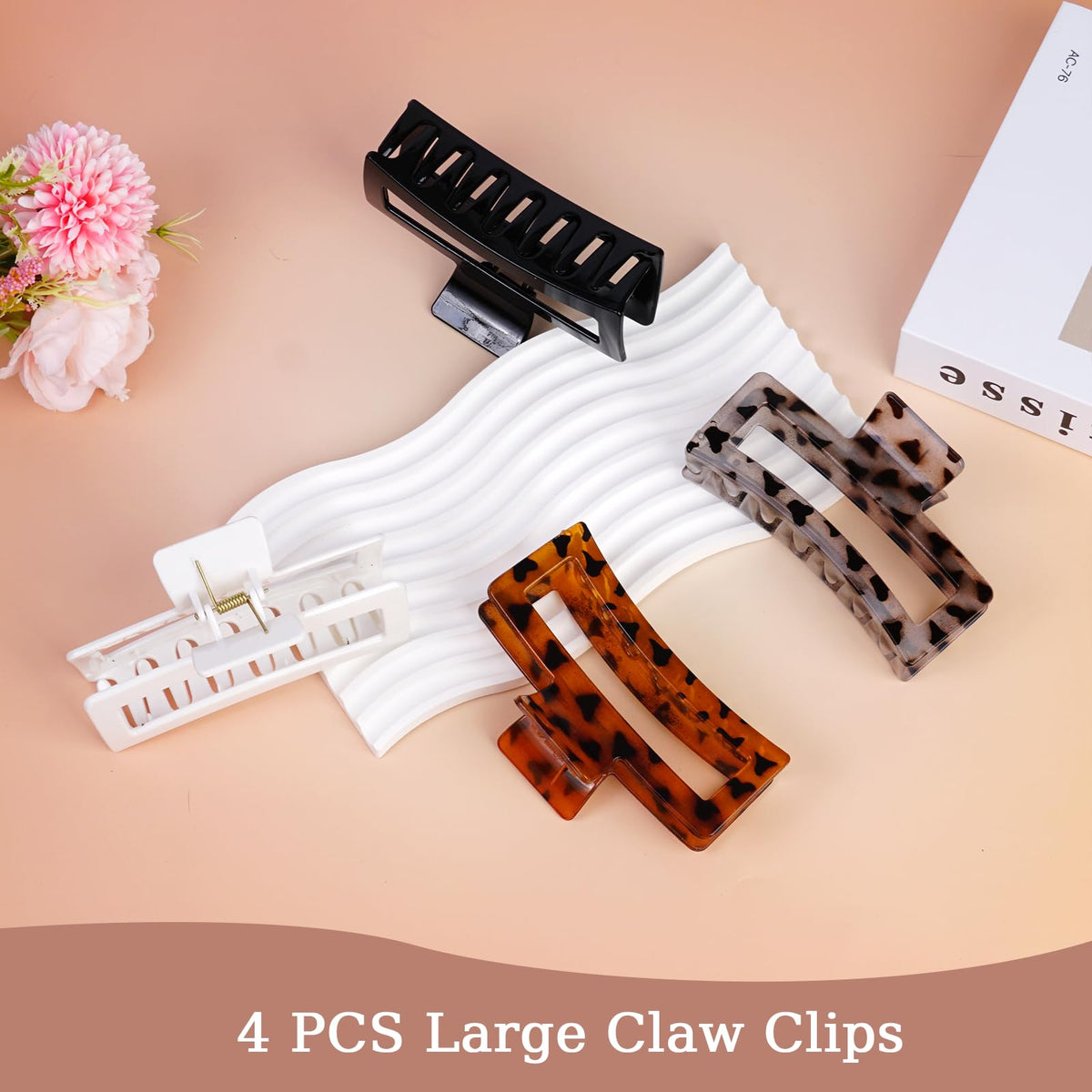 SEVEN STYLE clip held in hand to show true 5-inch scale and bulky-hair suitability