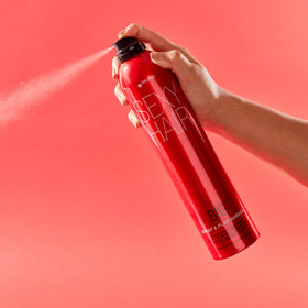 SexyHair can in hand for size comparison and portability benefit