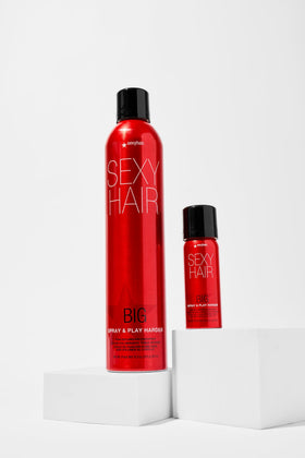 SexyHair model using spray to set voluminous hairstyle benefit