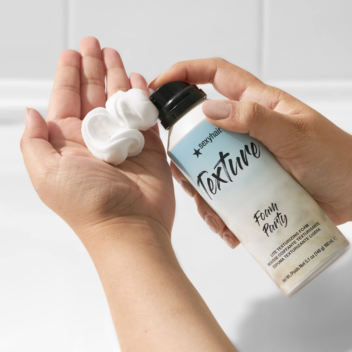 SexyHair pump dispenser detail revealing foam application control and ease
