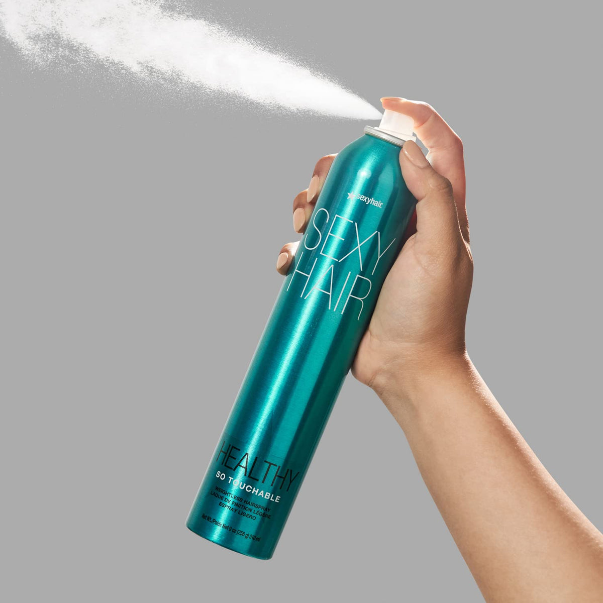 SexyHair can in hand to show real scale and convenient 9 oz portability