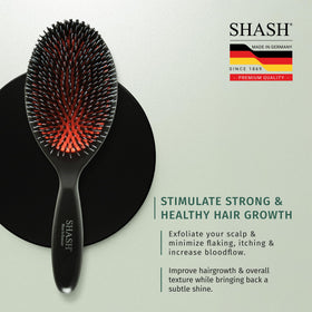 SHASH brush held in hand to show scale and comfortable large-size brushing
