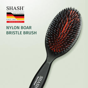 SHASH brush in a bathroom lifestyle setting suggesting daily grooming routine