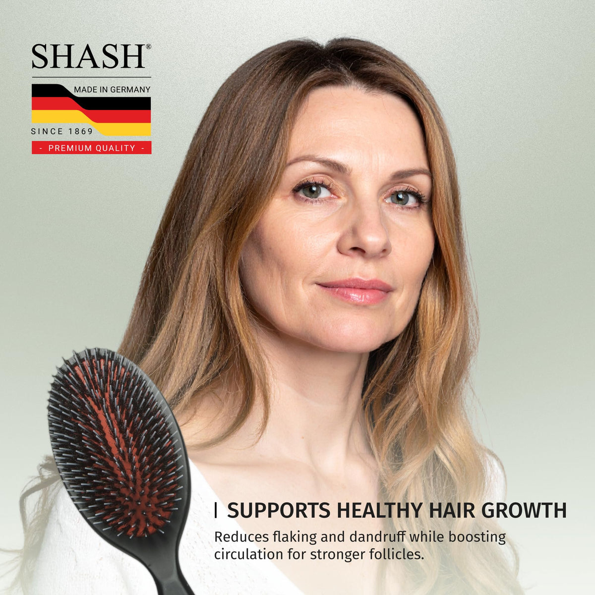 SHASH brush being used on damp hair to detangle gently and minimize breakage