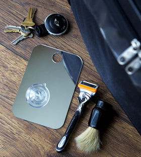 Shave Well mirror edge and surface detail showing shatterproof durability