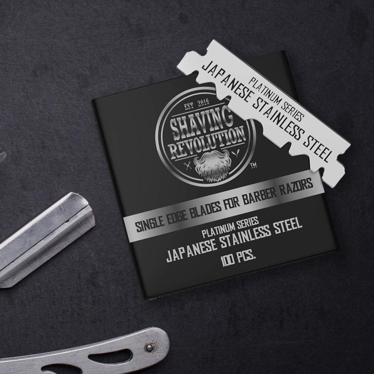 SHAVING REVOLUTION platinum-coated blade surface detail showing corrosion resistance
