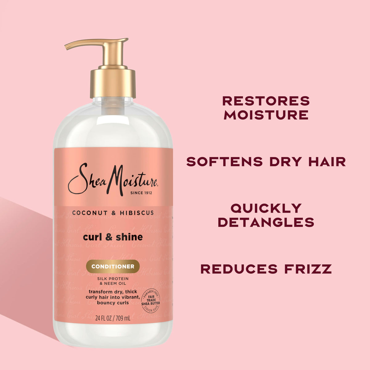 Shea Moisture 24 fl oz bottle held to show actual size and value