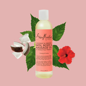 Shea Moisture 8 oz bottle next to common item for size and scale reference