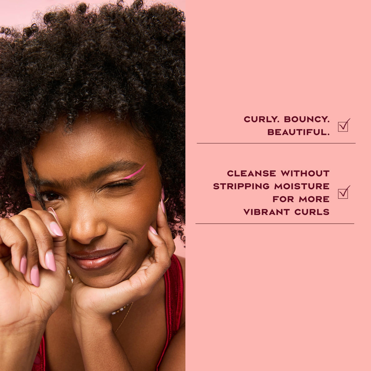 Shea Moisture shampoo applied to wet curls demonstrating defined results