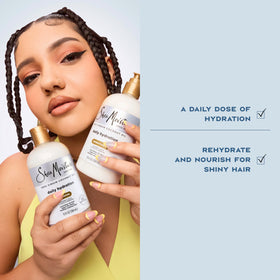 Shea Moisture coconut milk and shea butter ingredients display promoting nourishment