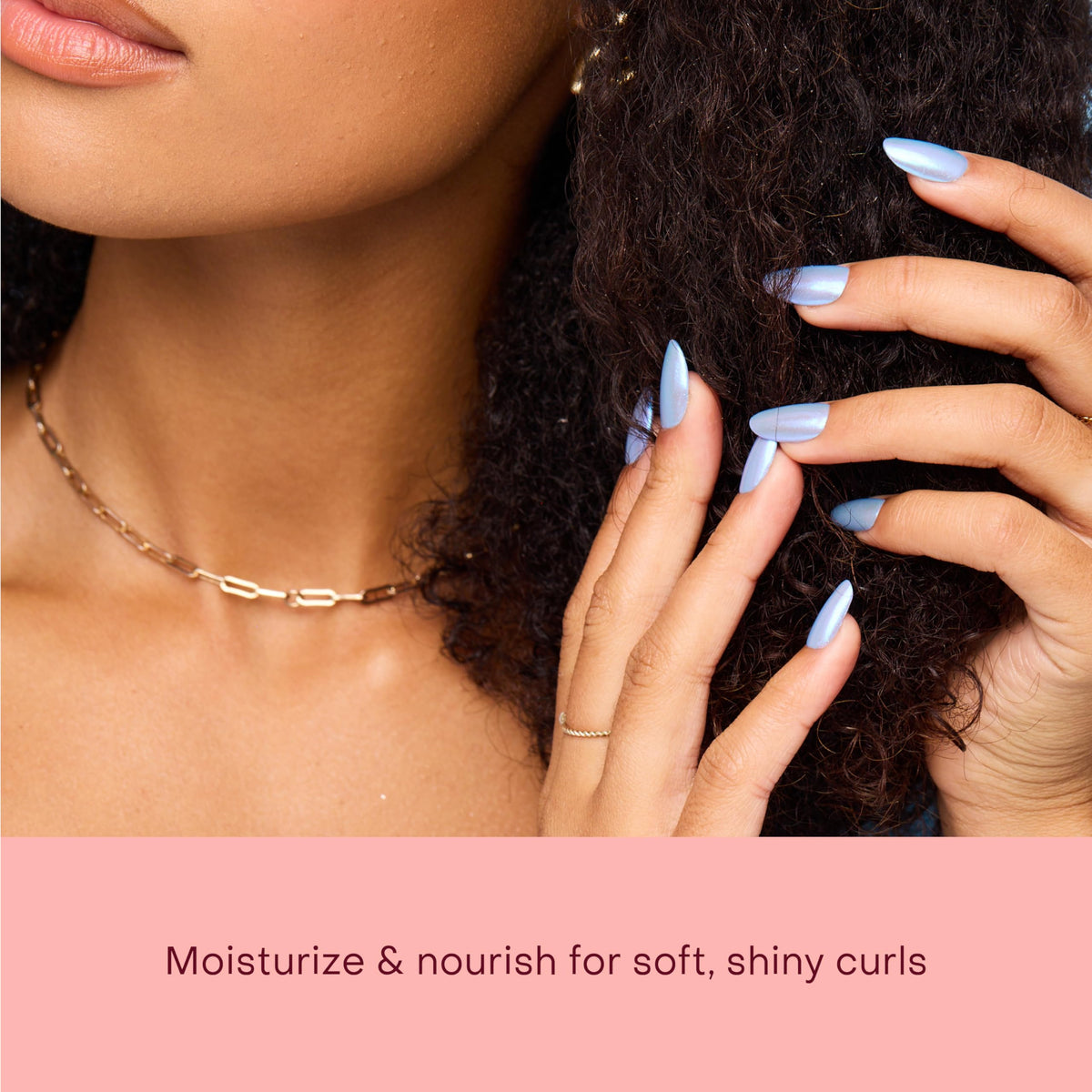 Shea Moisture arrangement of Manketti and coconut ingredients highlighting natural nourishing oils