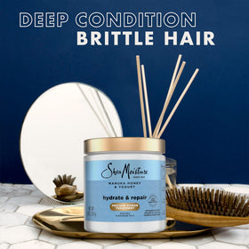 Shea Moisture two-pack next to a ruler showing 8 oz jar scale
