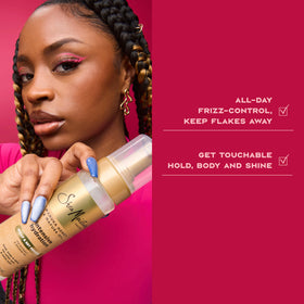 Shea Moisture mousse being applied to damp hair for smoother wrapping