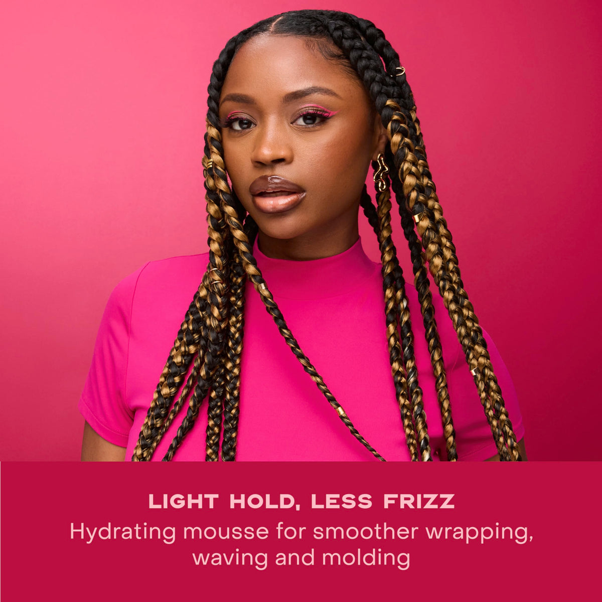 Shea Moisture bottle next to hand showing 7.5 oz size and portability