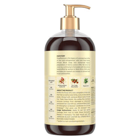 Shea Moisture creamy lather pouring from bottle for gentle cleansing