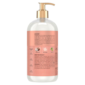 Shea Moisture pump close-up delivering easy, controlled conditioner dispensing