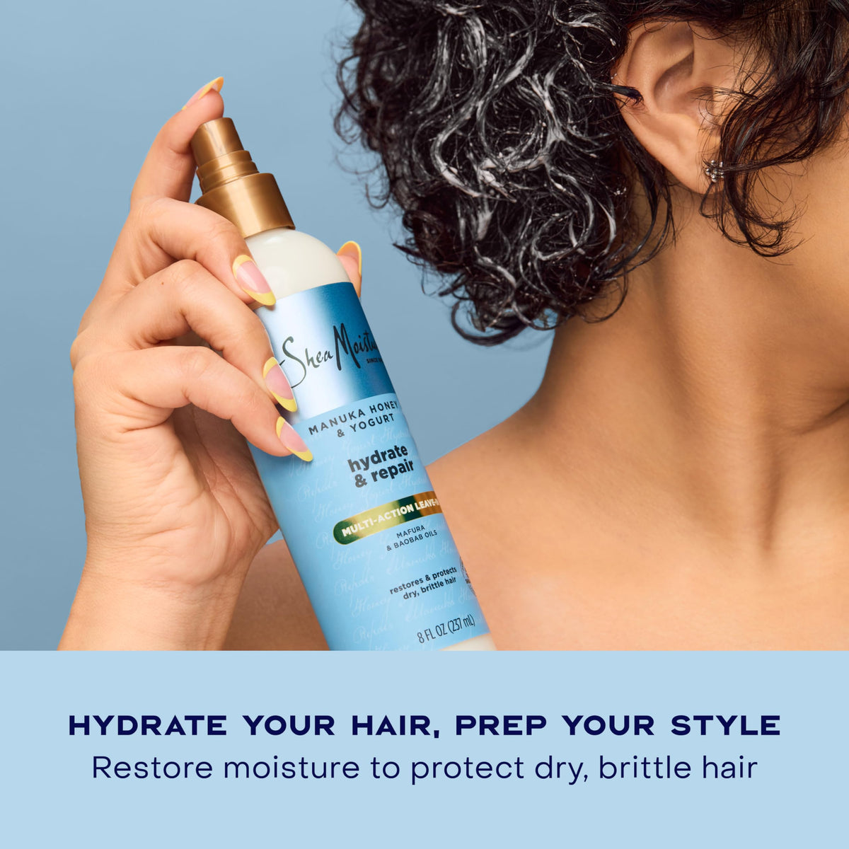 Shea Moisture creamy spray texture on fingers for hydration
