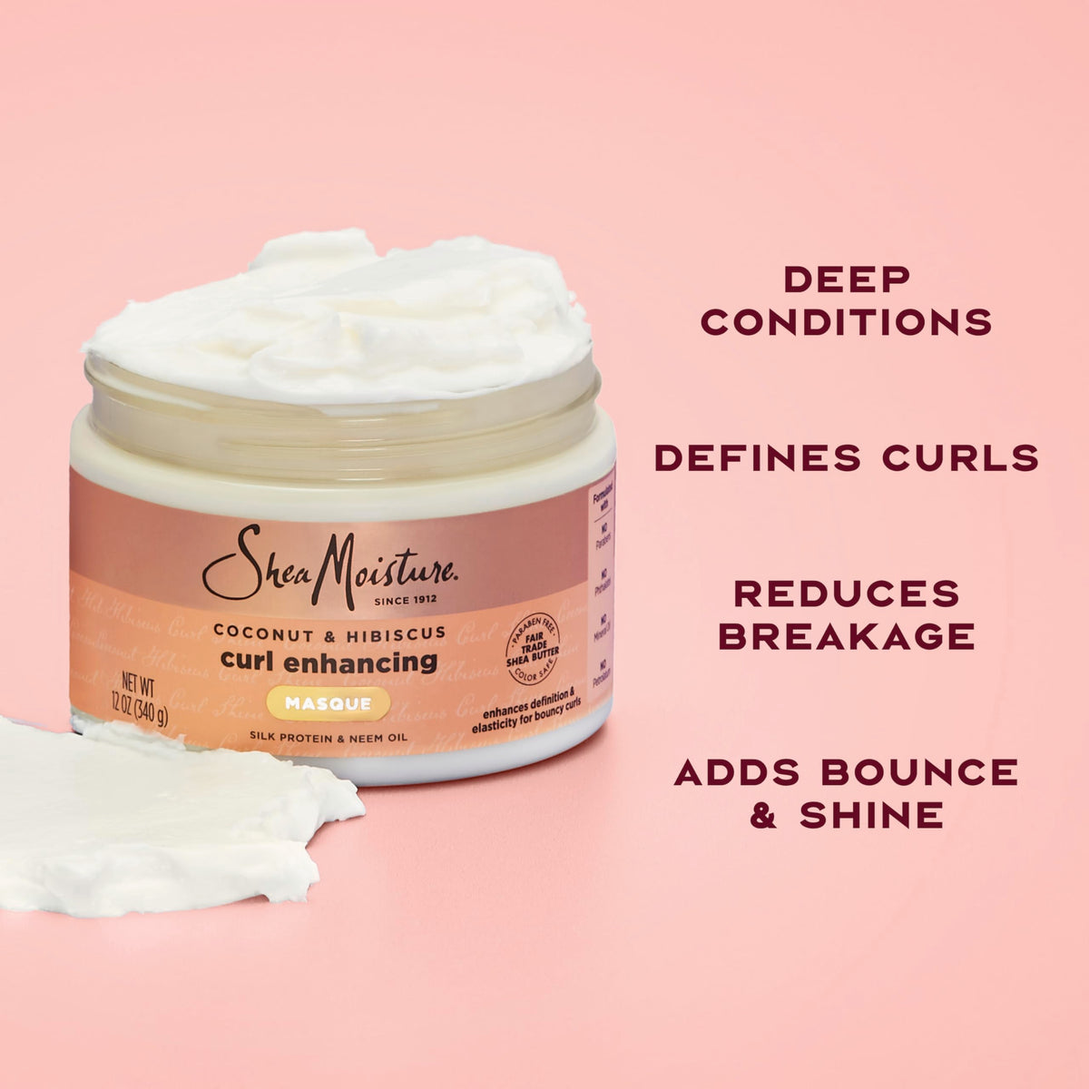 SheaMoisture being applied to wet hair for deep conditioning benefit