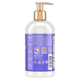 SheaMoisture close-up pump dispensing creamy conditioner for easy application