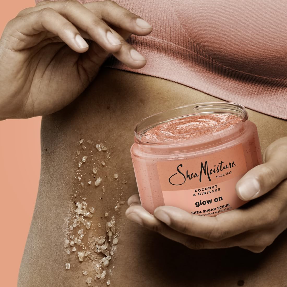 SheaMoisture scrub in hand demonstrating gentle exfoliation and moisturizing feel