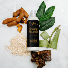 SheaMoisture focused application on elbow showing targeted hydration