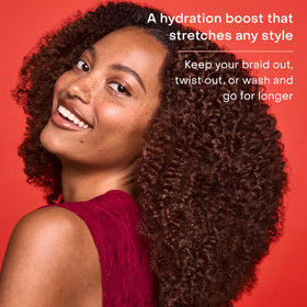 SheaMoisture before and after stretch showing reduced frizz