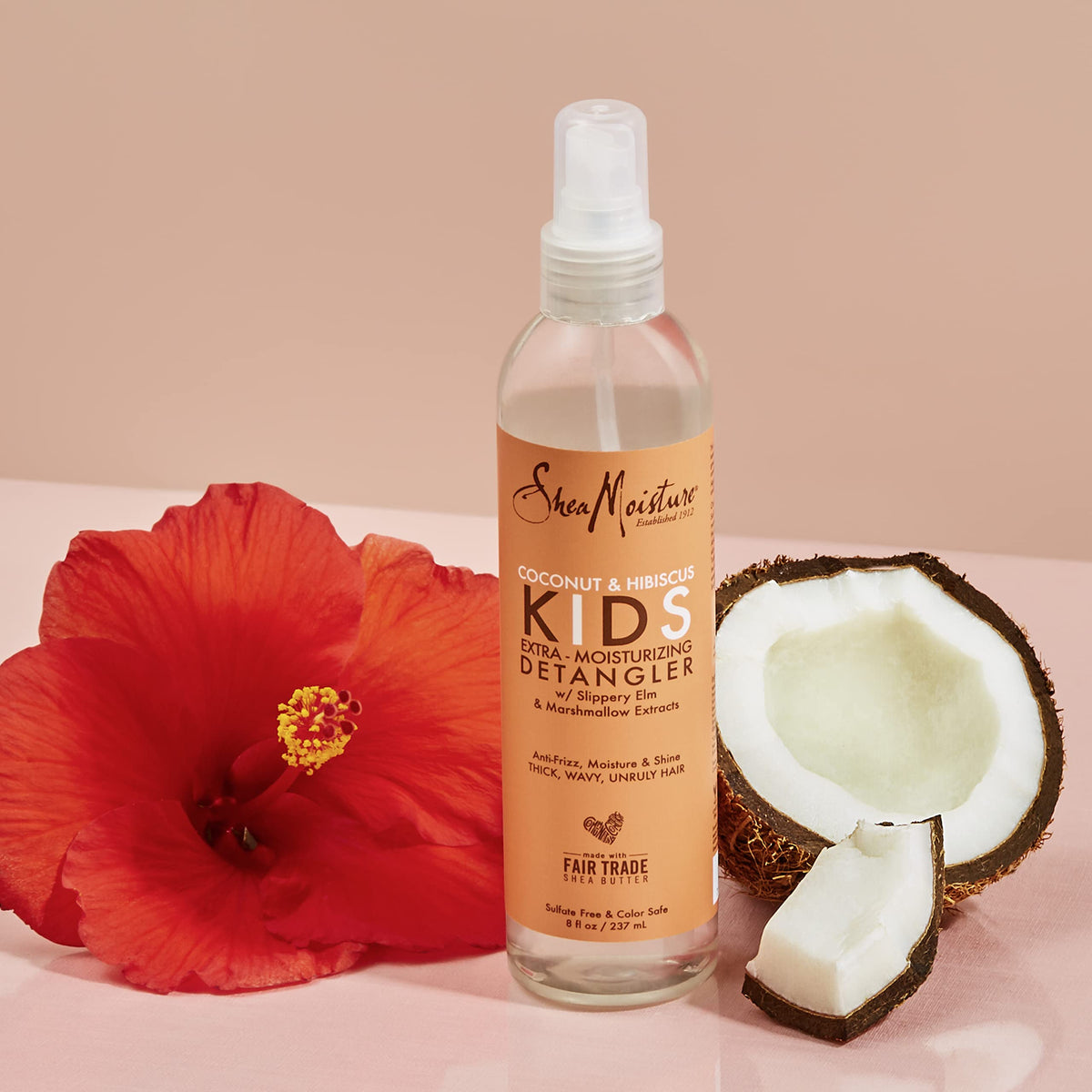SheaMoisture detangler staged in family bathroom during kids' routine