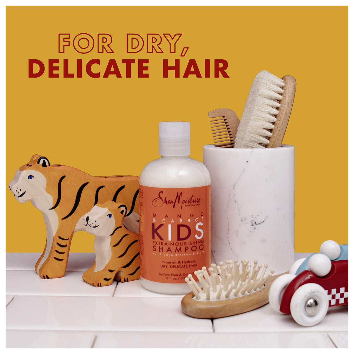 Shea Moisture mango and carrot ingredients closeup showing natural extracts