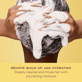 SheaMoisture ingredient label close-up showing no sulfates or silicones benefit