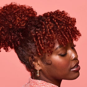 SheaMoisture label close-up highlighting coconut, hibiscus and flaxseed