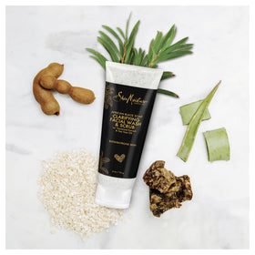 SheaMoisture lather on hand demonstrating cleansing action and gentle exfoliation